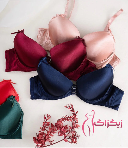 Collection of colorful bras on a white background with a brand logo.