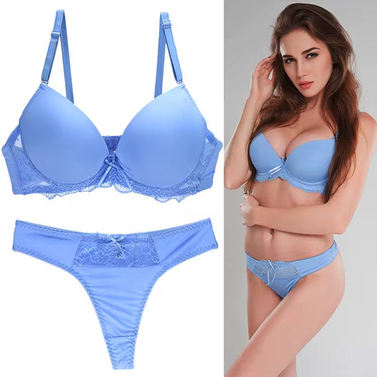 Blue lingerie set with a model wearing it on a plain background