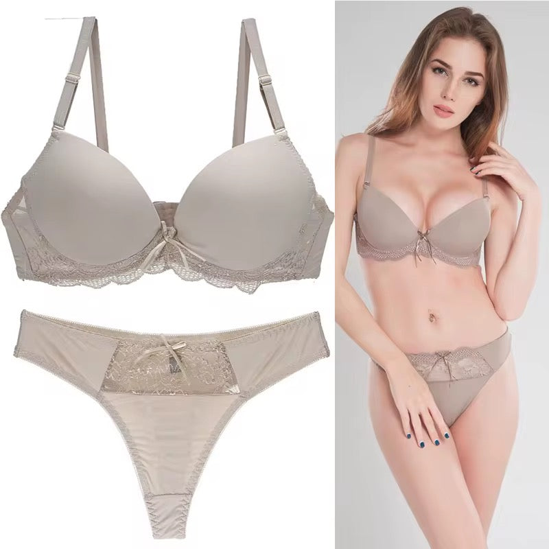 Beige bra and panties set with a model wearing them on a white background