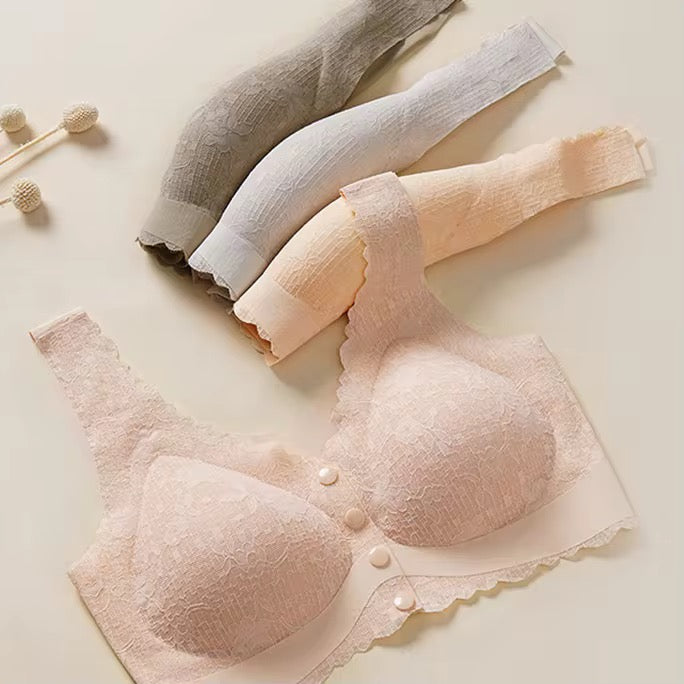 Pink bra with lace details on a light beige background
