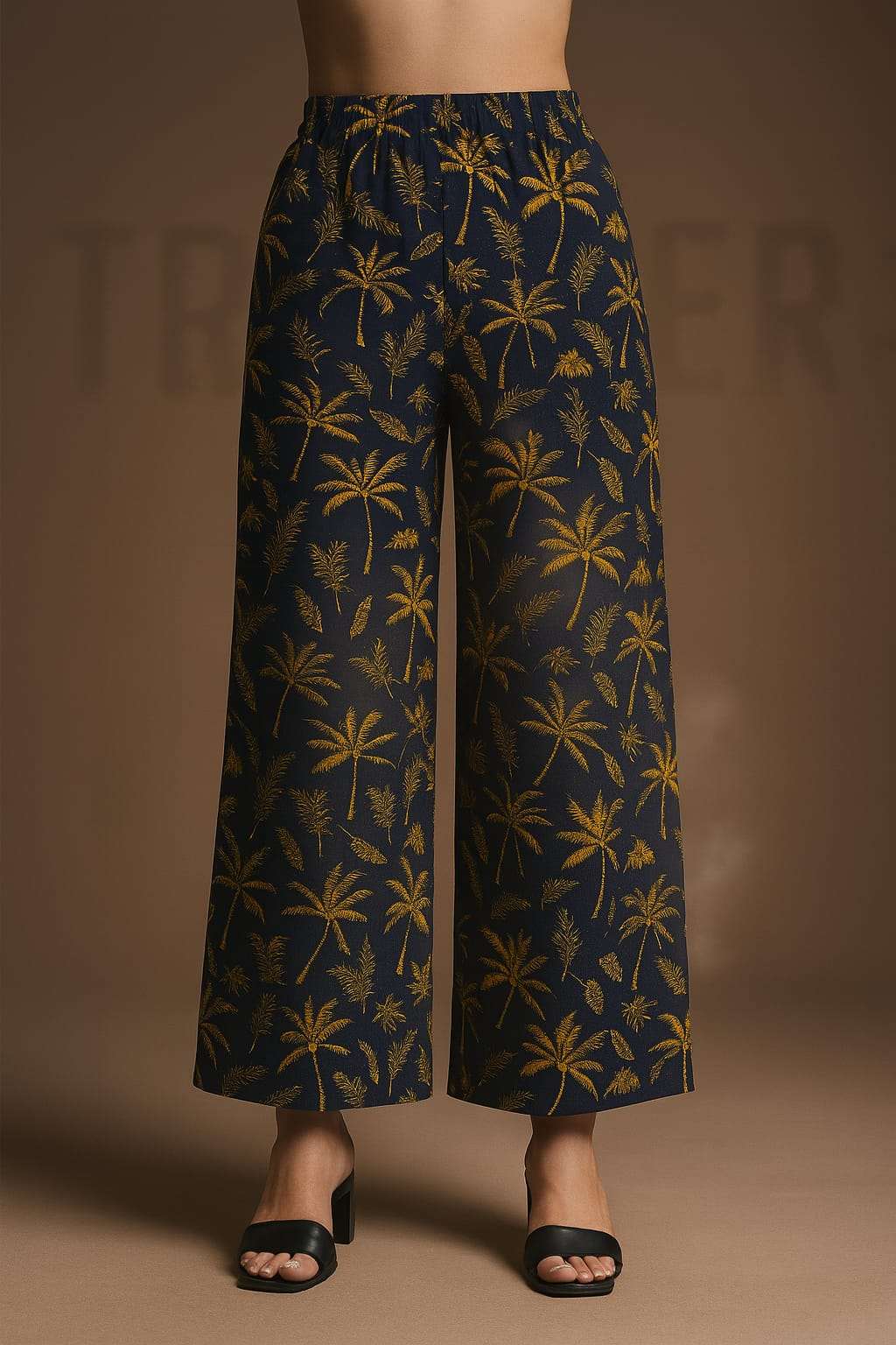 Wide-leg pants with palm tree pattern on a brown background