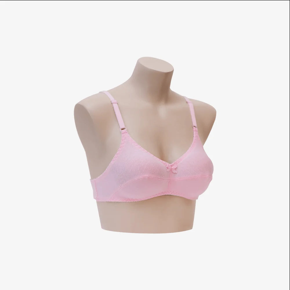 Pink bra on a mannequin bust against a white background