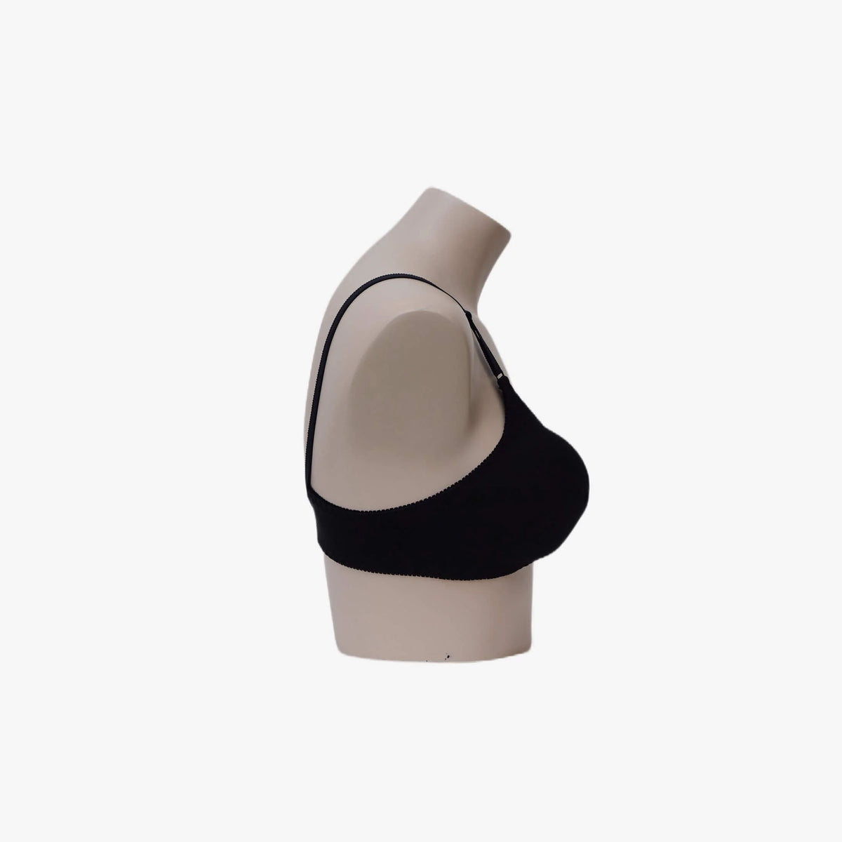 Black bra on a mannequin against a white background