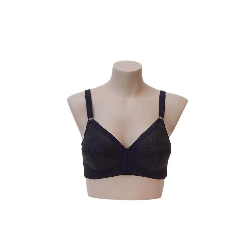 Black bra on a mannequin bust against a white background