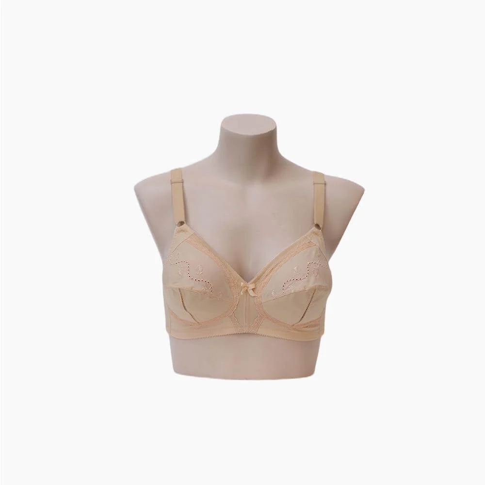 Beige bra on a mannequin against a white background