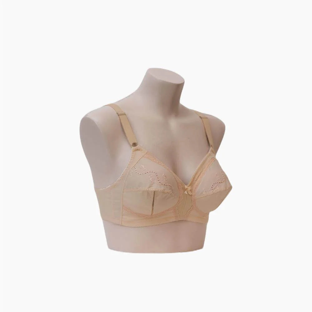 Beige bra on a mannequin against a white background