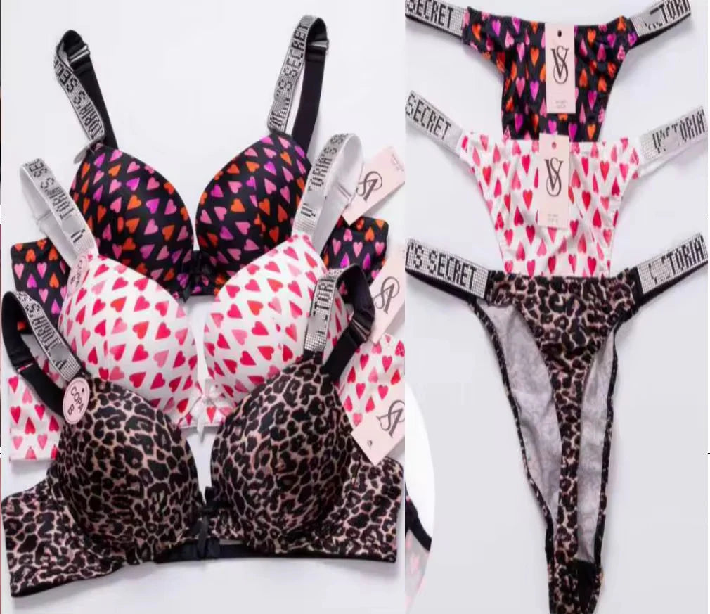 Victoria's Secret lingerie set with leopard print, heart pattern, and pink designs.