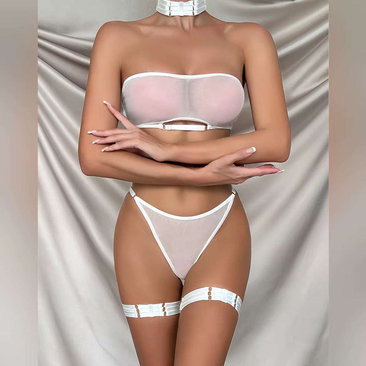 White lingerie set on a neutral background