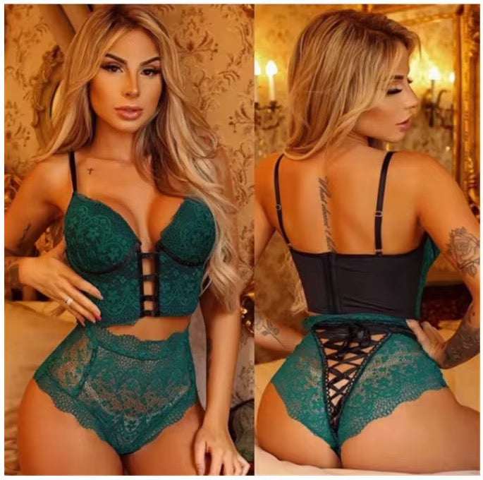 Woman wearing teal lace lingerie set in a decorated room.