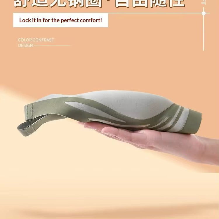 Insole with a hand holding it against a beige background