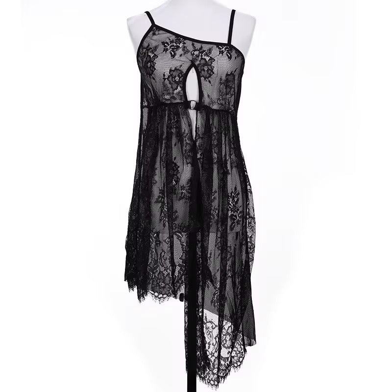 Black lace dress on a mannequin against a white background