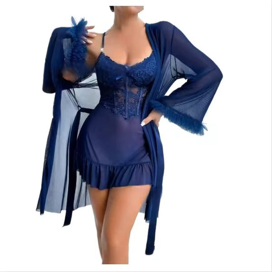 Blue lace dress with matching cardigan on a white background