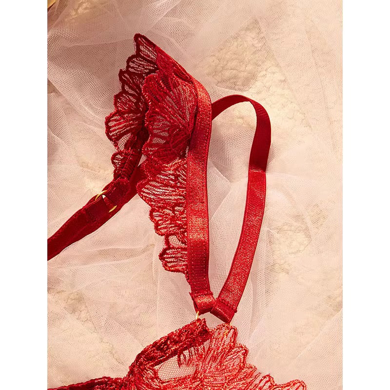 Red lace headband on a textured beige background