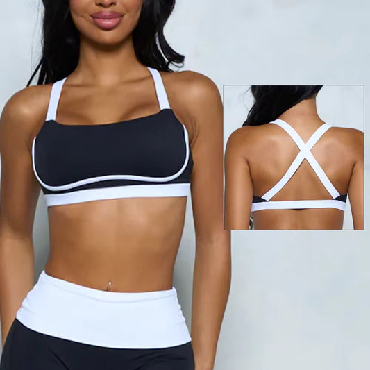 Woman wearing a black and white sports bra with inset showing back view.