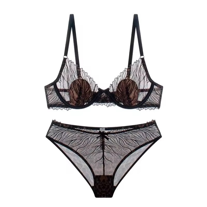 Black lace lingerie set on a white background
