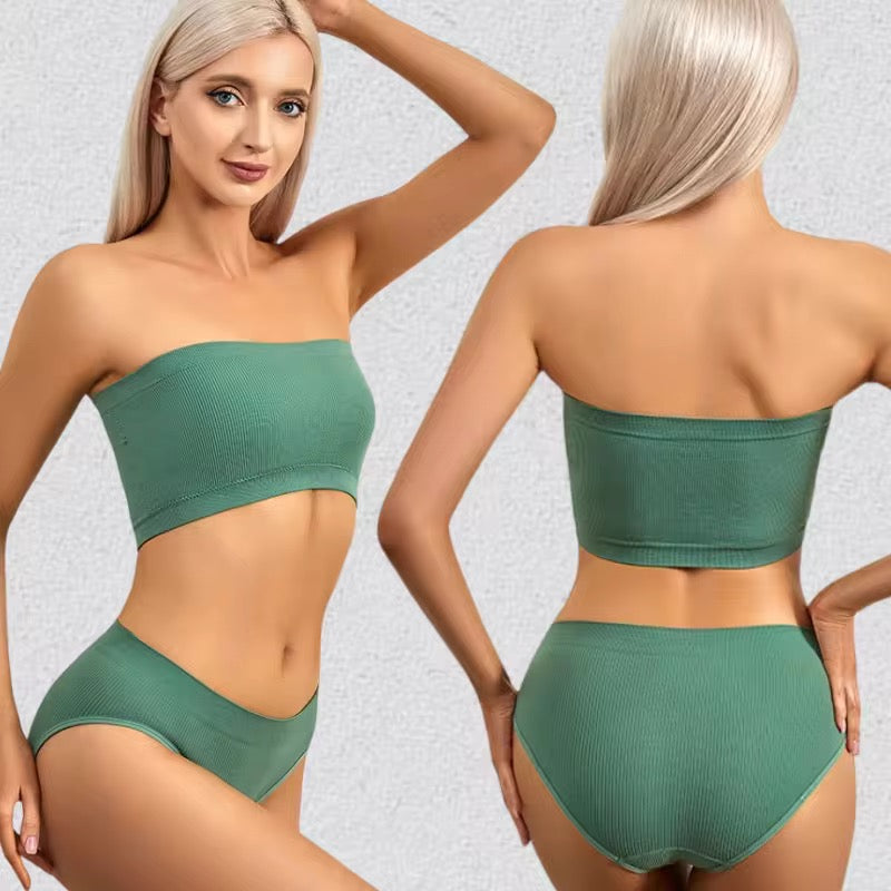 Green bikini set worn by a model on a light gray background