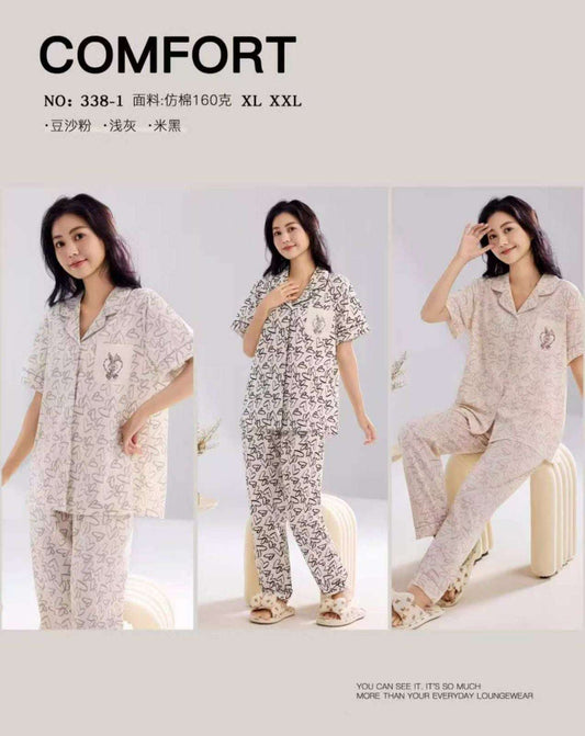 Woman wearing a pajama set with 'COMFORT' text and product details.